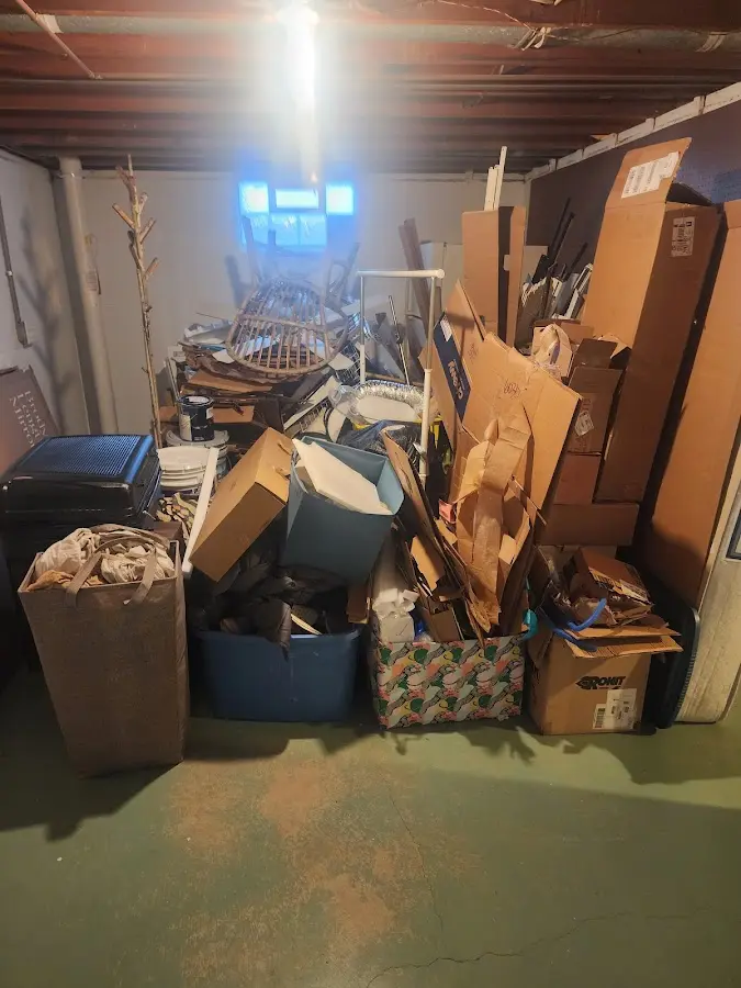 Roll-off dumpster container at job site for 8 Yard Dumpster Rental in Avon